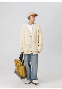 Cardigan in maglia strutturata bianco crema pesante con scollo a V e vestibilità oversize