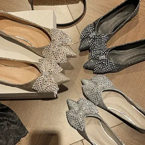 Sparkly sequin pointed toe ballet flats with large bow for party and wedding