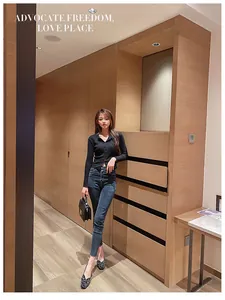 Chic black square-toe flats with textured finish shown on an Asian model in an indoor setting