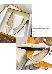 Close-up of elegant beige pointed-toe flat shoes with pearl and bow detail.