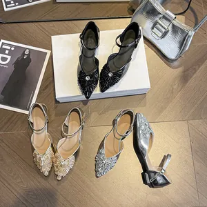 Elegant rhinestone pointed-toe low-heel sandals shown in black, gold, and silver variants.
