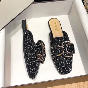 Elegant black flat mules featuring sparkling rhinestones and pearls for women's summer