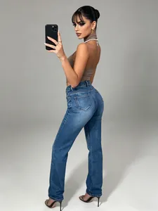 Side view of model wearing American style washed blue stretch straight-leg denim jeans