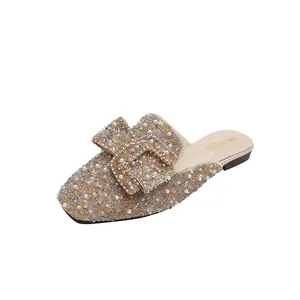 Elegant champagne rhinestone and pearl embellished pointed toe flat mules for women