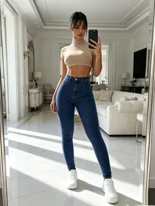 Close-up of high-waisted elastic skinny jeans in a stylish street fashion look