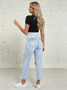 Back view of light blue ripped maternity jeans with a grey high elastic belly band