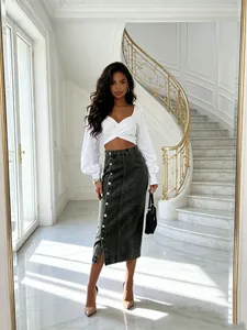 Elegant single-breasted split denim midi skirt paired with a stylish white crop top