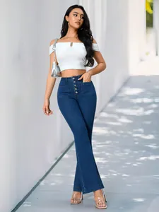 Eleganti jeans a zampa elasticizzati blu scuro da donna con bottoni frontali chic