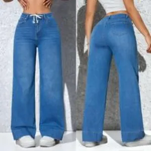 Vista detallada de vaqueros vintage de pierna ancha para mujer con cordón en cintura