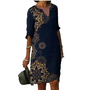 Vintage navy blue V-neck dress with gold mandala print and three-quarter sleeves