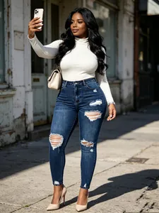 Jean skinny déchiré taille haute bleu foncé pour femme avec une coupe très extensible