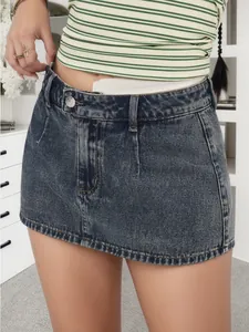 Detailed close-up view of vintage-washed denim mini skirt with secure inner lining.