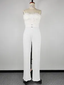 Detail view of white strapless jumpsuit with feather bodice and belt for women's fashion.