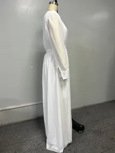 Side view of white double-layer chiffon french court style maxi gown on mannequin