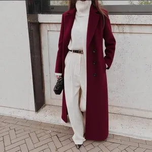 Elegant burgundy long wool coat for women featuring a minimalist winter street style look