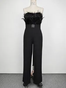 Elegant black jumpsuit featuring a luxurious feather tube top and wide-leg trousers