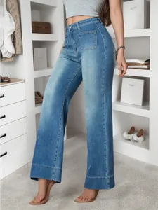 American vintage style wide-leg blue jeans shown on a model in a closet setting