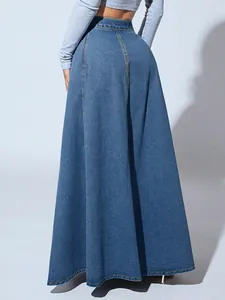 Detailed back view showing the fabric texture and drape of a blue denim A-line skirt
