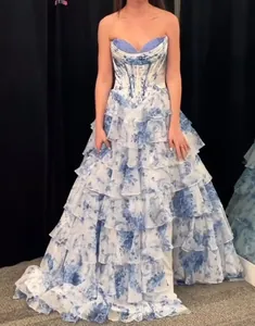 Elegant French style floral strapless evening gown with layered ruffled tier skirt