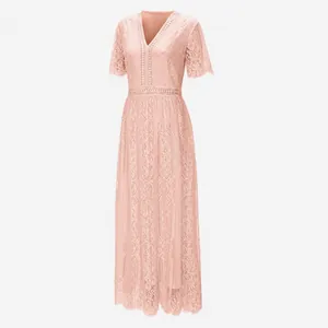 Detailed view of an elegant peach pink lace maxi dress with a deep V-neckline