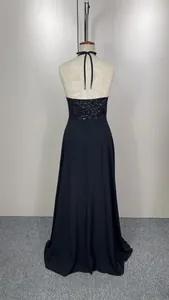 Detailed back view of elegant black halter sequin chiffon evening dress for formal proms