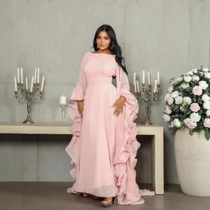 Elegant pink mesh evening gown featuring ruffled sleeves and a large swing puffy skirt