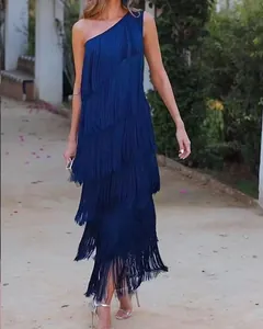 Elegant navy blue one-shoulder dress with tiered fringe layers for evening events