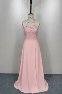 Close-up detail of a pink halter lace chiffon prom dress featuring an elegant split hem.