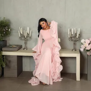 Elegant pink evening gown with voluminous layered ruffle sleeves and maxi length