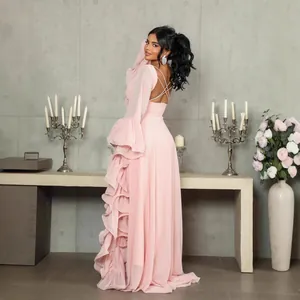 Elegant pink mesh evening gown with ruffled layers and open back design for women