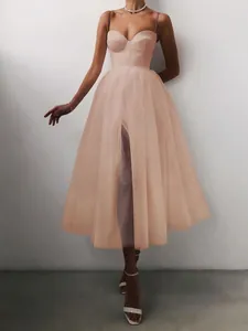 Elegant blush spaghetti strap mesh dress with sweetheart neckline and front slit detail
