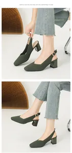 Detailed view of the olive green ribbed fabric and sturdy chunky heel on slingback pumps