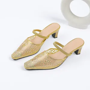 Elegant gold square toe high heeled mules featuring sparkling rhinestone mesh pattern details