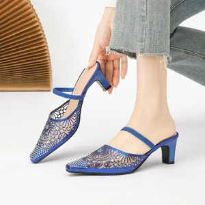 Elegant blue square toe rhinestone high heel mules featuring a unique cut-out design