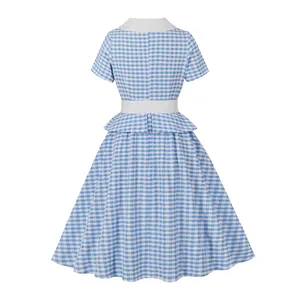 Back view of retro blue and white gingham dress with white collar and peplum waist.