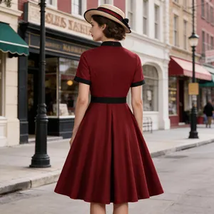 Back view of a vintage burgundy A-line midi dress on a European street background