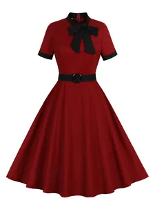 Full front view of a vintage wine red midi dress with black bow and belt details.