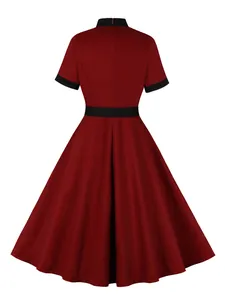 Detailed back view of a vintage wine red cotton midi dress featuring black contrast trim