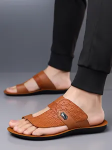 Detailed view of brown textured men's sandals with soft soles and anti-slip design