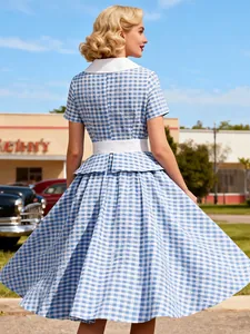 Elegant vintage blue and white gingham swing dress with white collar and peplum waistline