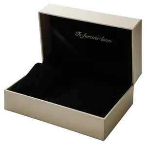 Elegant champagne gold flip-top watch gift box with premium black velvet interior