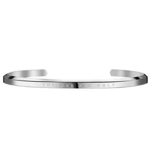 Minimalist silver cuff bracelet with the 'THE ONE AND ONLY' engraved lettering.