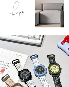 Macro view of stylish canvas strap student quartz watches with dual calendar features