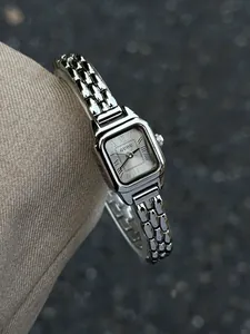 Elegant vintage silver square watch for women with Roman numerals and metal bracelet