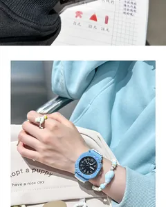 Detail shot of light blue student quartz watch with canvas strap and dual calendar