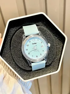 Montre Gccliyo en silicone vert menthe avec cadran papillon dans son coffret