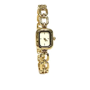 Vintage gold quartz watch for women with minimalist rectangular dial and chain link strap