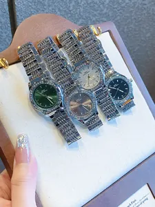 Elegante juego de relojes para mujer con biseles de pedrería y correas de acero