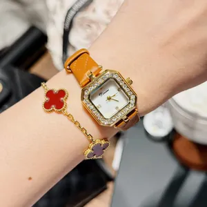 Detail view of Dinimi square watch with rhinestones and stylish leather strap on wrist