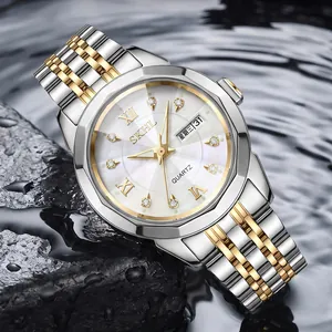 Reloj de lujo impermeable para mujer con correa bicolor en plata y oro.